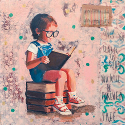 Bambina seduta libri